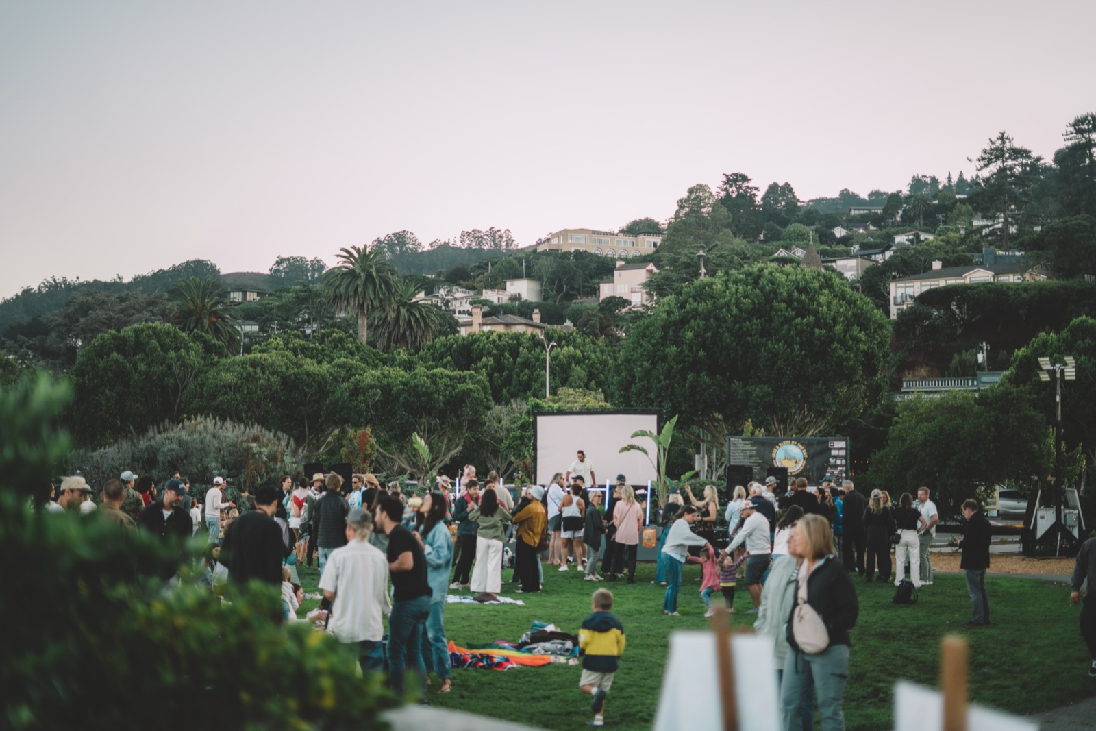 The festival crowd at dusk in Dunphy Park, DJs by the Bay 2025